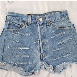 Levi’s Distressed Denim cutoffs